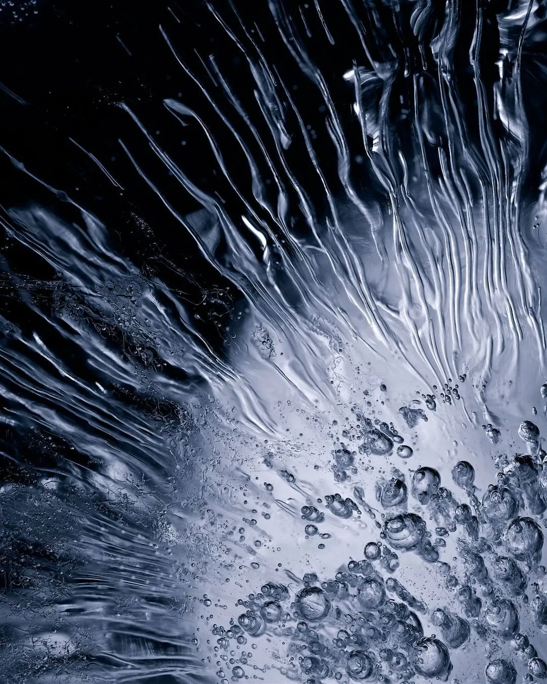 Abstract dark water-splash texture — BIOHACKER